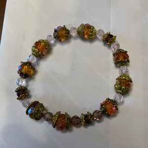 Brown and clear beaded bracelet with elastic band